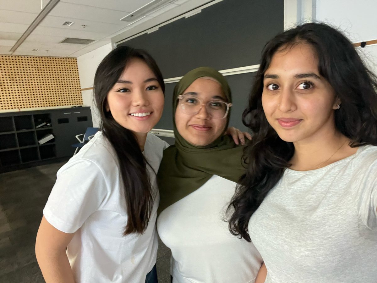 Students smiling together during a bootcamp break