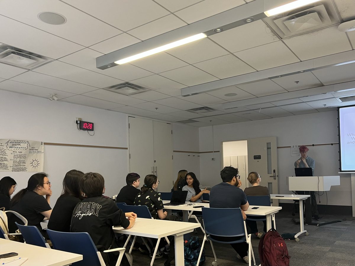 Participants engaging in a peer discussion